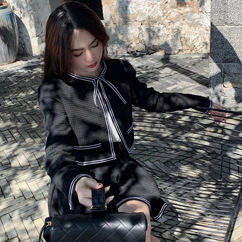 Set áo khoác dạ bố đen cột nơ kèm chân váy dáng xoè