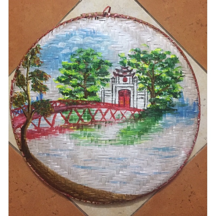 Tranh vẽ Hồ gươm, phố cổ size 45cm trên mẹt tre