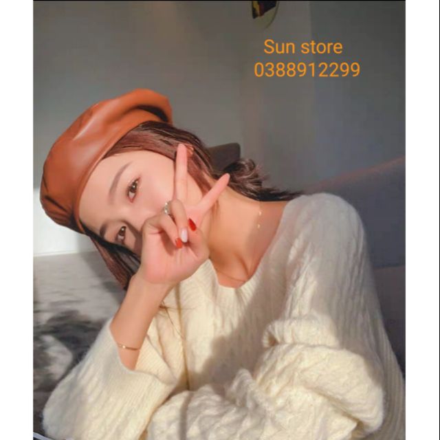 Áo len trơn vặn thừng