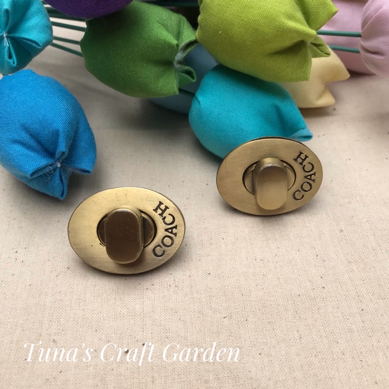 Khoá xoay ovan Coach làm khóa nắp túi xách handmade