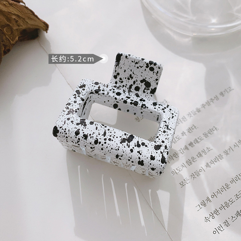 Kẹp tóc hình bò sữa trắng đen phong cách Hàn Quốc