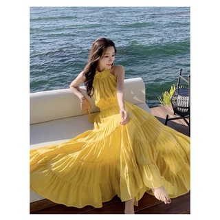 Đầm maxi vàng cổ yếm hở lưng