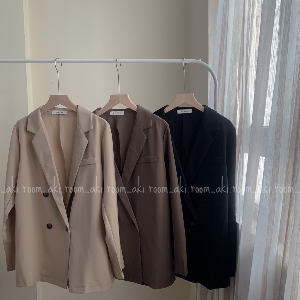 Áo blazer một lớp bốn khuy túi giả ngực trái