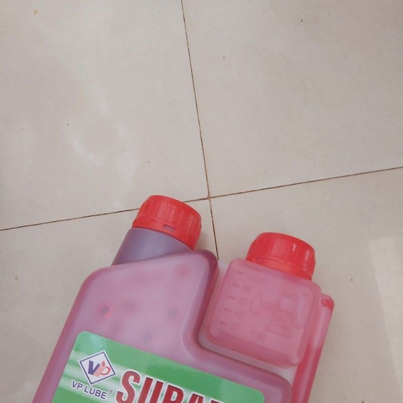 Nhớt 2 thì đỏ pha xăng cưa phát cỏ