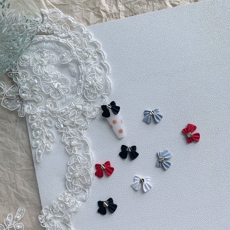 Charm nơ sứ trang trí nail / móng tay