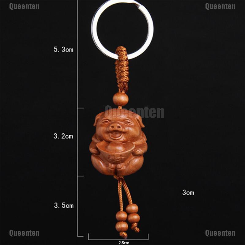 Móc khóa hình chú lợn con may mắn bằng gỗ độc đáo sành điệu