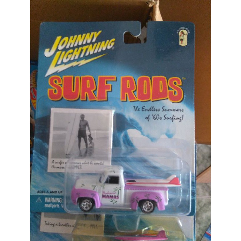 xe Johnny Lightning bán tải có ván lướt sóng màu tím , hàng hiếm