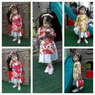 Áo dài cách tân chất liệu gấm hoa to