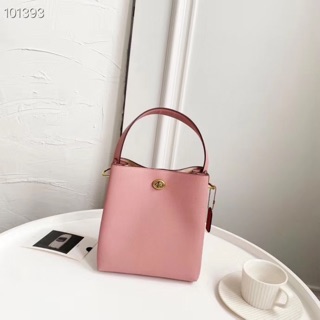 Túi Coach bucket da thật màu hồng nude