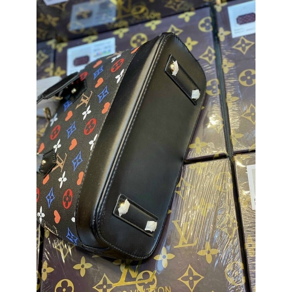 Túi xách nữ dáng hến hoa văn LV