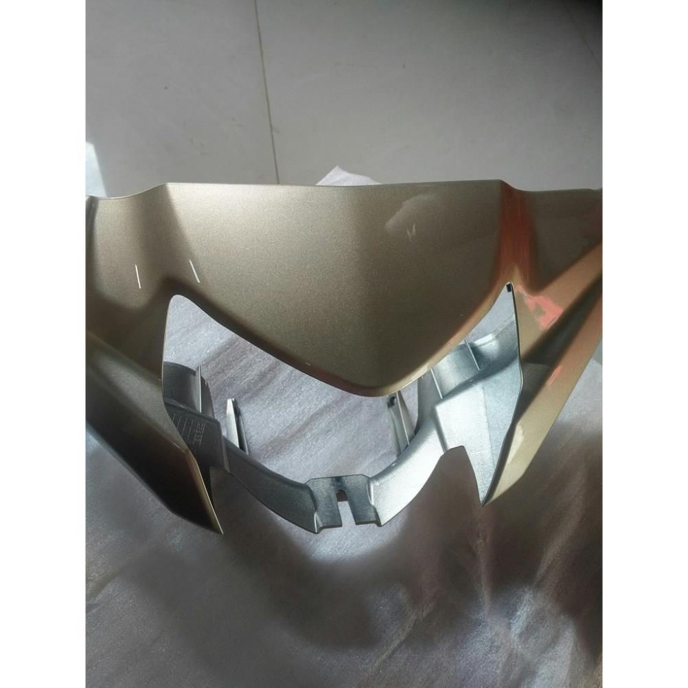 Ốp đầu trước (Nắp trước tay lái) Taurus vàng xám