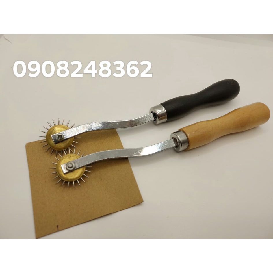 Cây lăn lấy dấu(cây sang dấu) lấy dấu trên rập vật liệu .