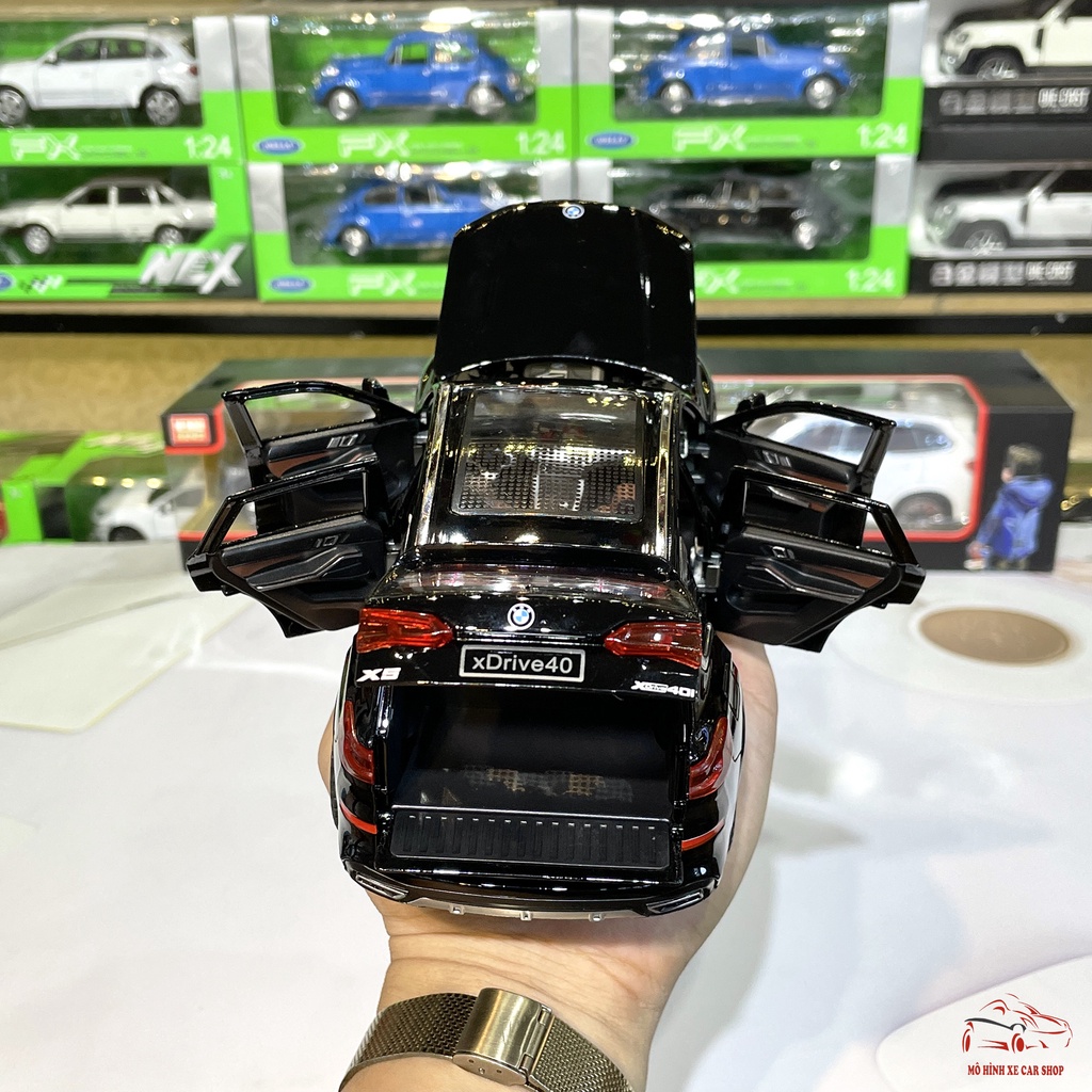 Mô hình xe ô tô hợp kim BMW X5 Driver tỉ lệ 1:24 đánh lái, bấm còi hãng Newao 3 màu