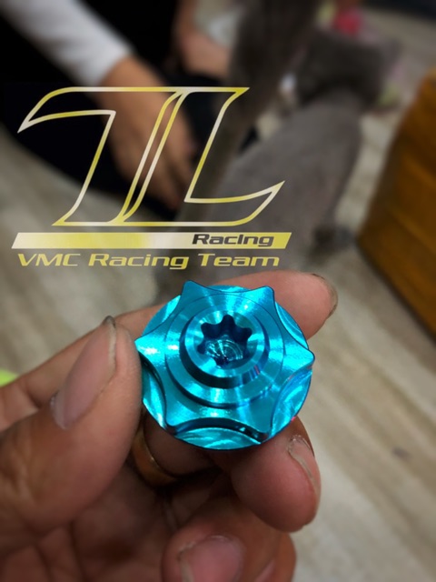 Ốc nắp nhớt titan