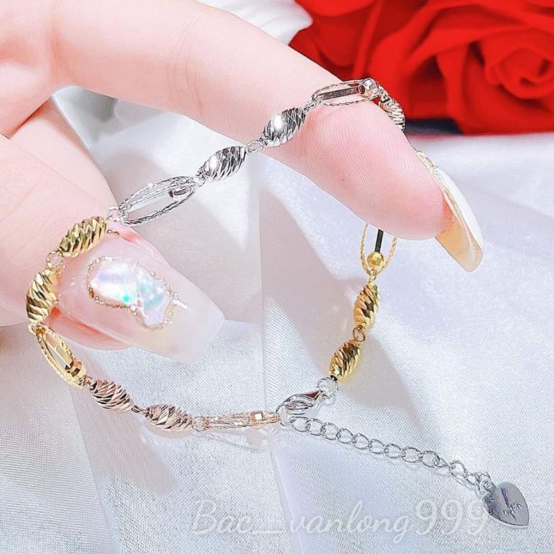 Lắc tay bạc xi