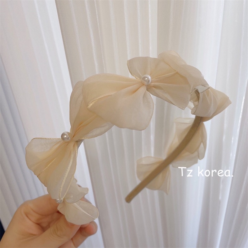 Bờm tóc đính chiếc nơ voan cánh xoè tiểu thư BT578