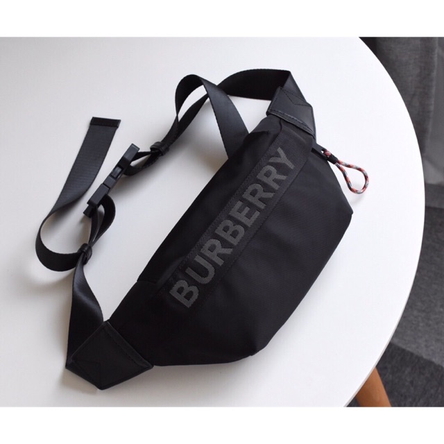Túi đeo chéo + bao tử Burberry
