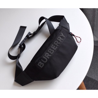 Túi đeo chéo + bao tử Burberry