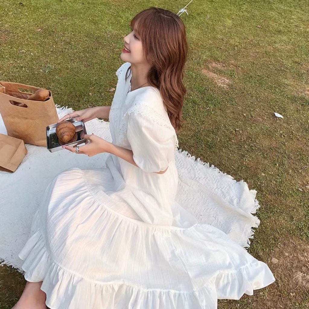 Đầm dáng rộng màu trắng dài hơn đầu gối thời trang cho nữ