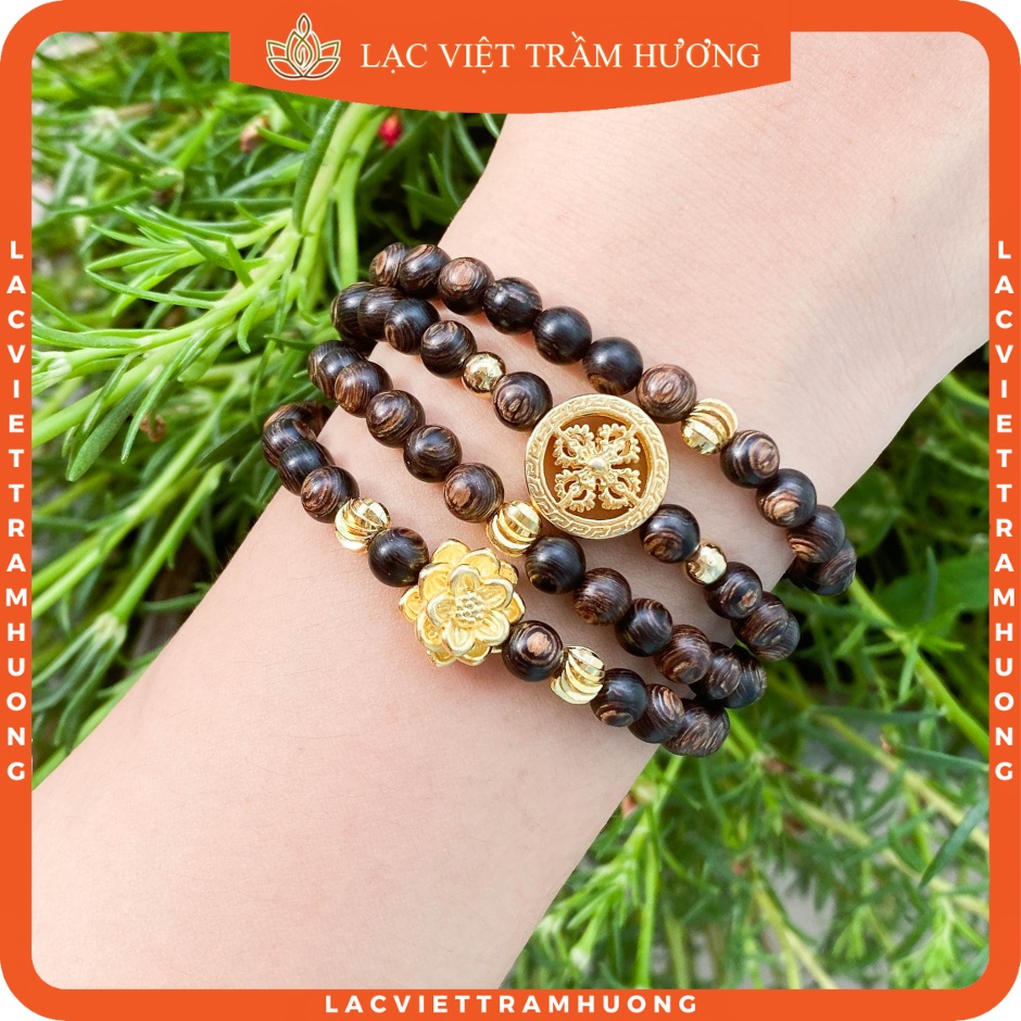 Vòng Tay Trầm Hương 108 Hạt Sánh Chìm Mix Charm Hoa Sen Vàng Phú Quý và Bánh Xe Pháp Luân Vàng - Lạc Việt Trầm Hương