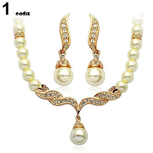 Bộ dây chuyền + bông tai hình đôi cánh đính ngọc trai giả