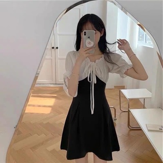 váy đen trắng cổ nơ