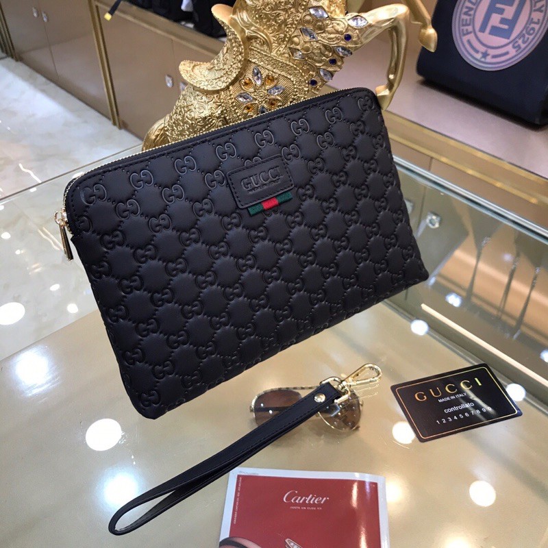 ví tab đứng khoá kéo da logo nổi dáng mỏng gucci Gc GG