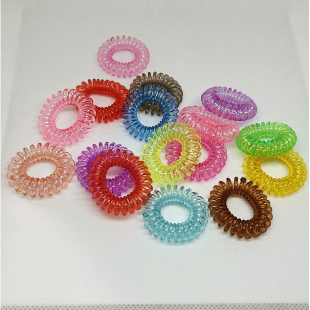 Dây buộc tóc lò xo, cột tóc xoắn nhiều màu, bằng nhựa dẻo - tránh gây rụng tóc