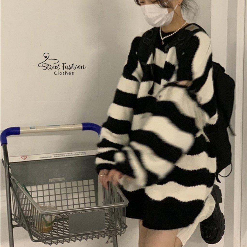 Áo len sweater hoạ tiet kẻ ngang đen trắng cách điệu rách tay phong cách cá tính, trẻ trung, năng động