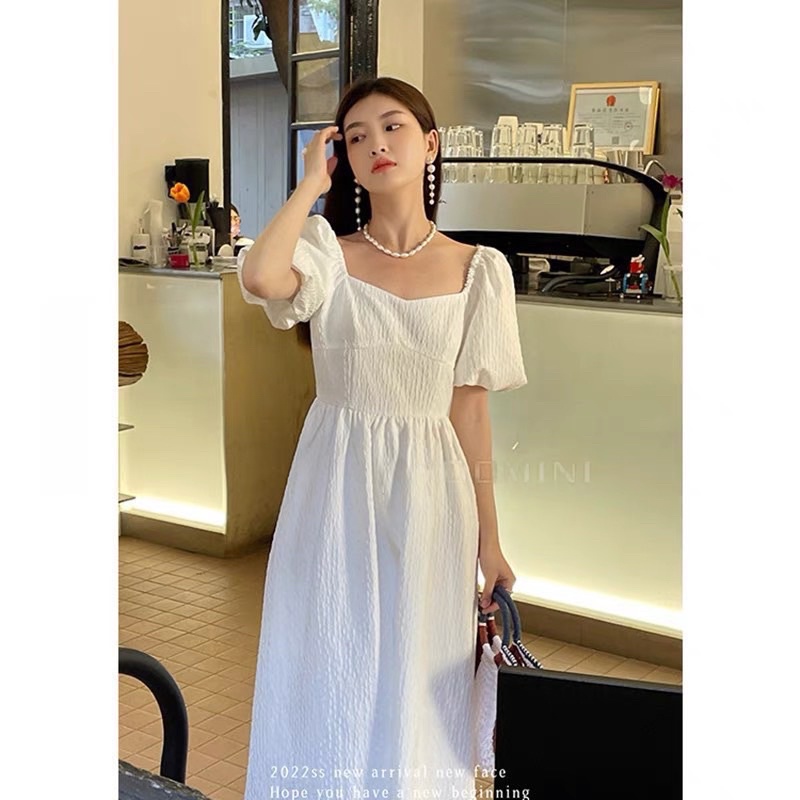 Đầm gấm xốp tay bồng tiểu thư - hở lưng mix chun