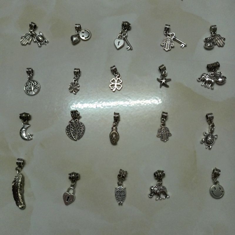 Charm ống lùa bạc thái làm chặn vòng