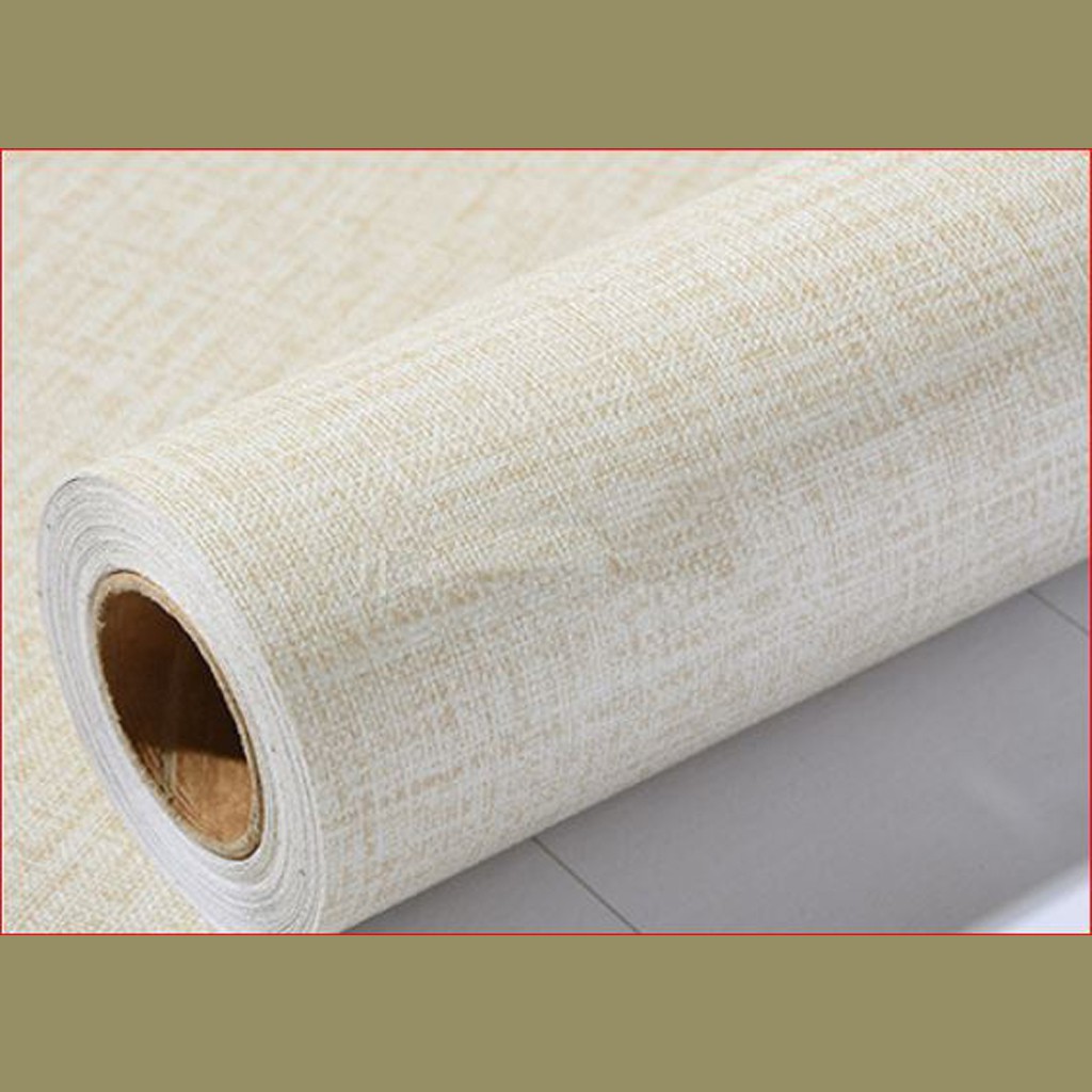 1 cuộn dài 5m ngang 60cm giấy dán tường giả vải màu nâu nhạt, có keo sẵn, có thể lau được khi bẩn