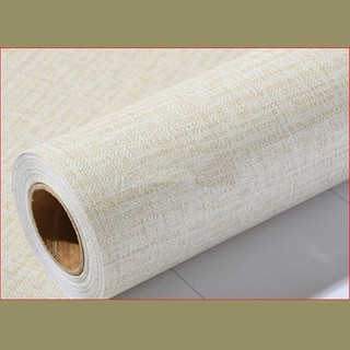 1 cuộn dài 5m ngang 60cm giấy dán tường giả vải màu nâu nhạt, có keo sẵn, có thể lau được khi bẩn