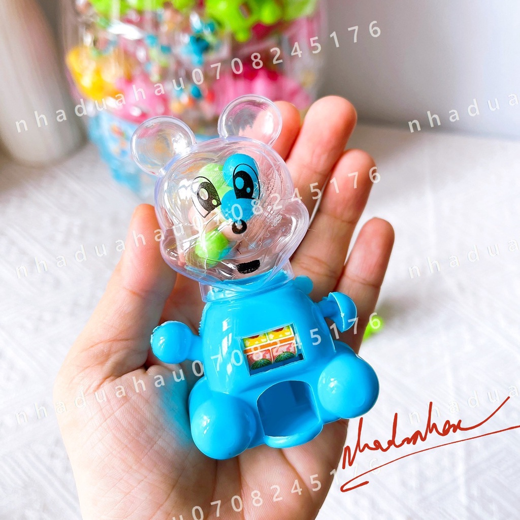 Một lốc gồm 20 cái máy bắn kẹo đồ chơi (kèm kẹo) hình gấu dễ thương Hongkong cái 20gam