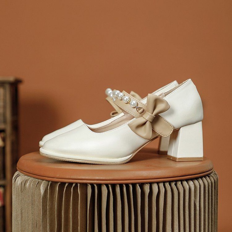 Giày cao gót mũi vuông đính nơ ngọc trai thiết kế cho nữ