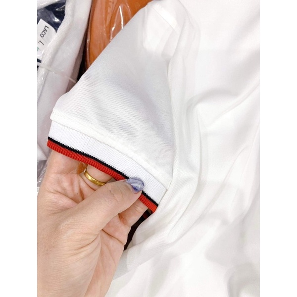 ÁO POLO NAM ĐEN TRẮNG CỔ & TAY VIỀN ĐỎ .