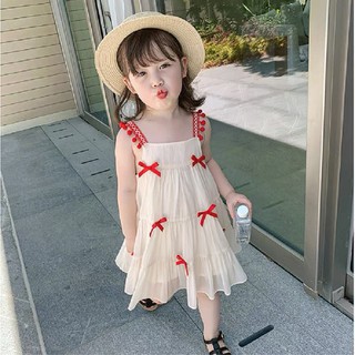 Váy 2 dây đính nơ đỏ siêu xinh