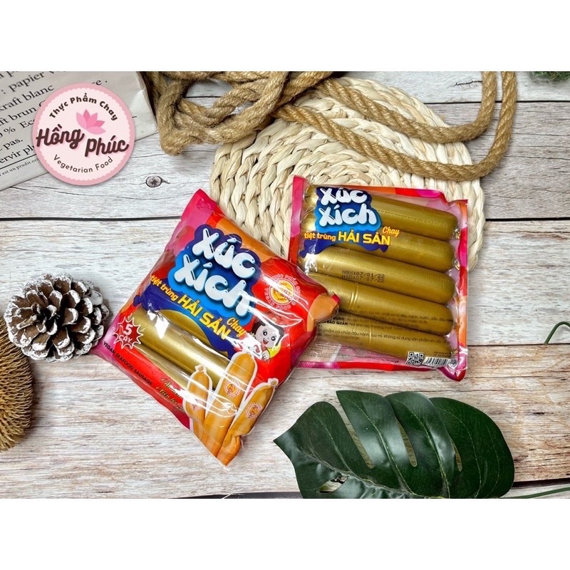 XÚC XÍCH CHAY HẢI SẢN .