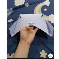 Nón y tá hàng may thủ công.