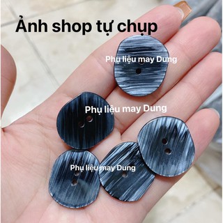 nút vest 2 lỗ cừ