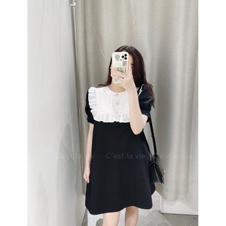 Váy đen cổ bèo trắng cúc đá