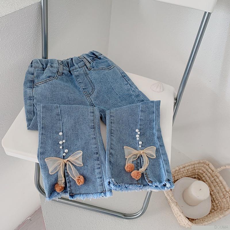 Quần jeans ống loe đính nơ thời trang cho bé gái