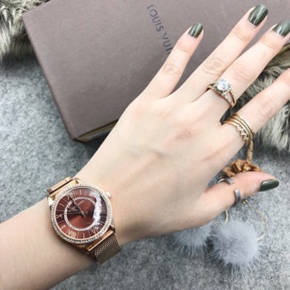 Đồng hồ dây lưới nút hít nam châm