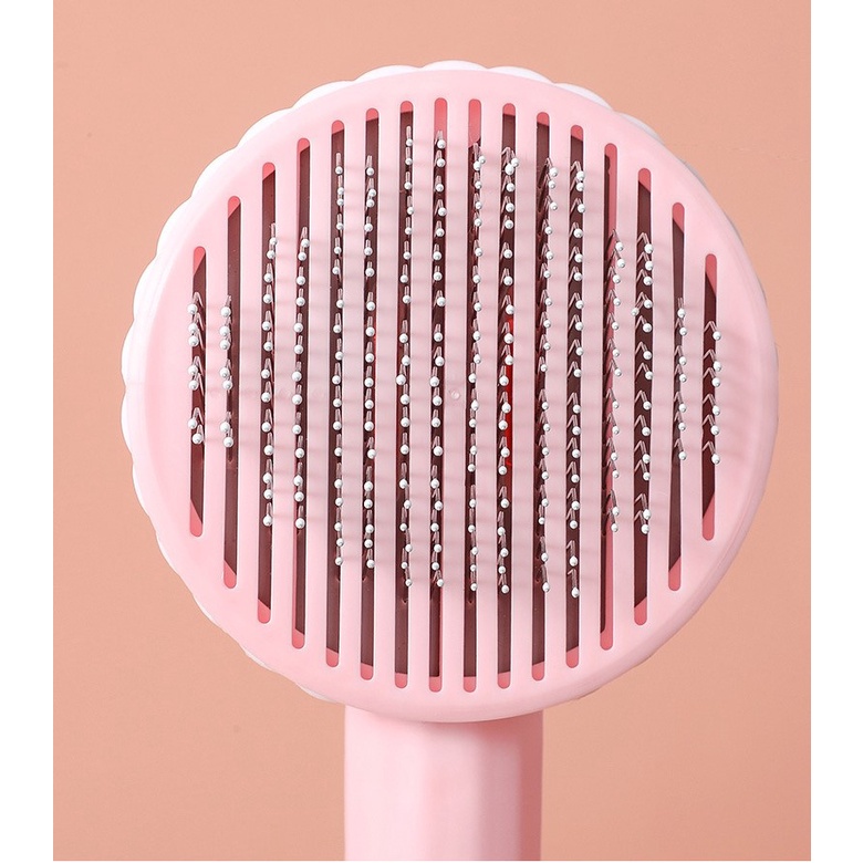 lược tròn chải lông rụng có nút bấm cho thỏ, chó, mèo