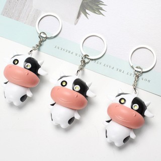 Móc treo chìa khóa hình bò sữa dễ thương, có thể phát nhạc, có đèn chiếu sáng cực đẹp, móc khóa cute
