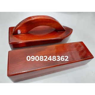 Cục gỗ ủi quần ao