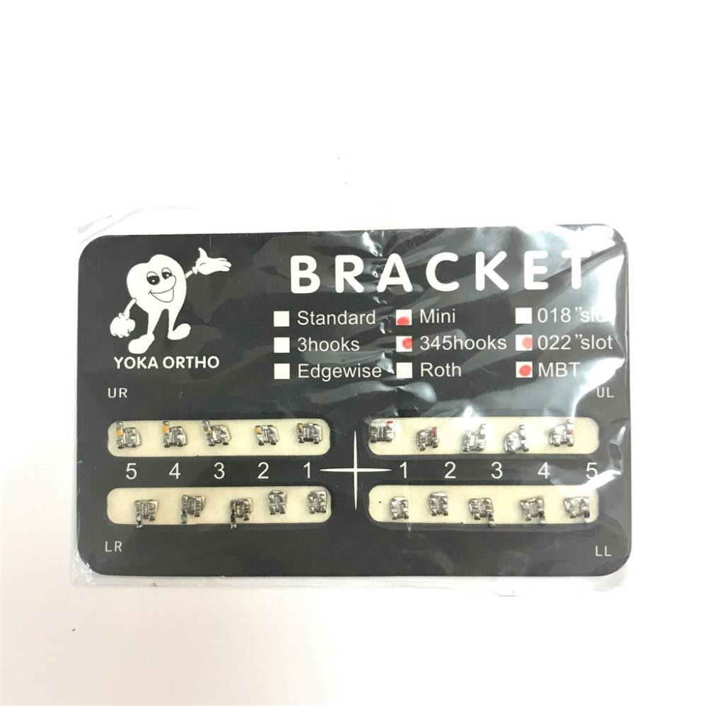 Mắc cài kim loại chỉnh nha, mắc cài bao giấy