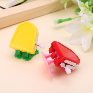 Đồ Chơi Răng Nhảy Lên Dây Cót