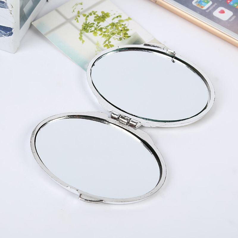 Gương trang điểm mini bỏ túi hình tròn hai mặt có thể gập lại được tiện dụng