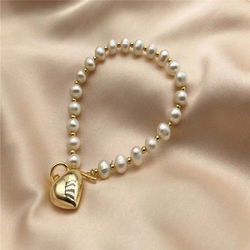 Vòng tay 7ly mix charm trái tim - NT35 - Ngọc Trai Trường Thịnh